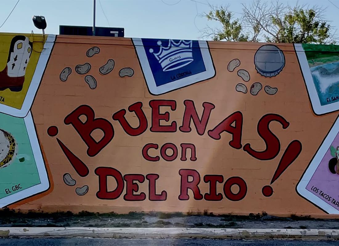 Del Rio, TX - Closeup View of a Painted Mural in Del Rio Texas with the Wording Buenas con Del Rio